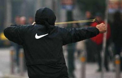 Greek-protests-slingshot.jpg