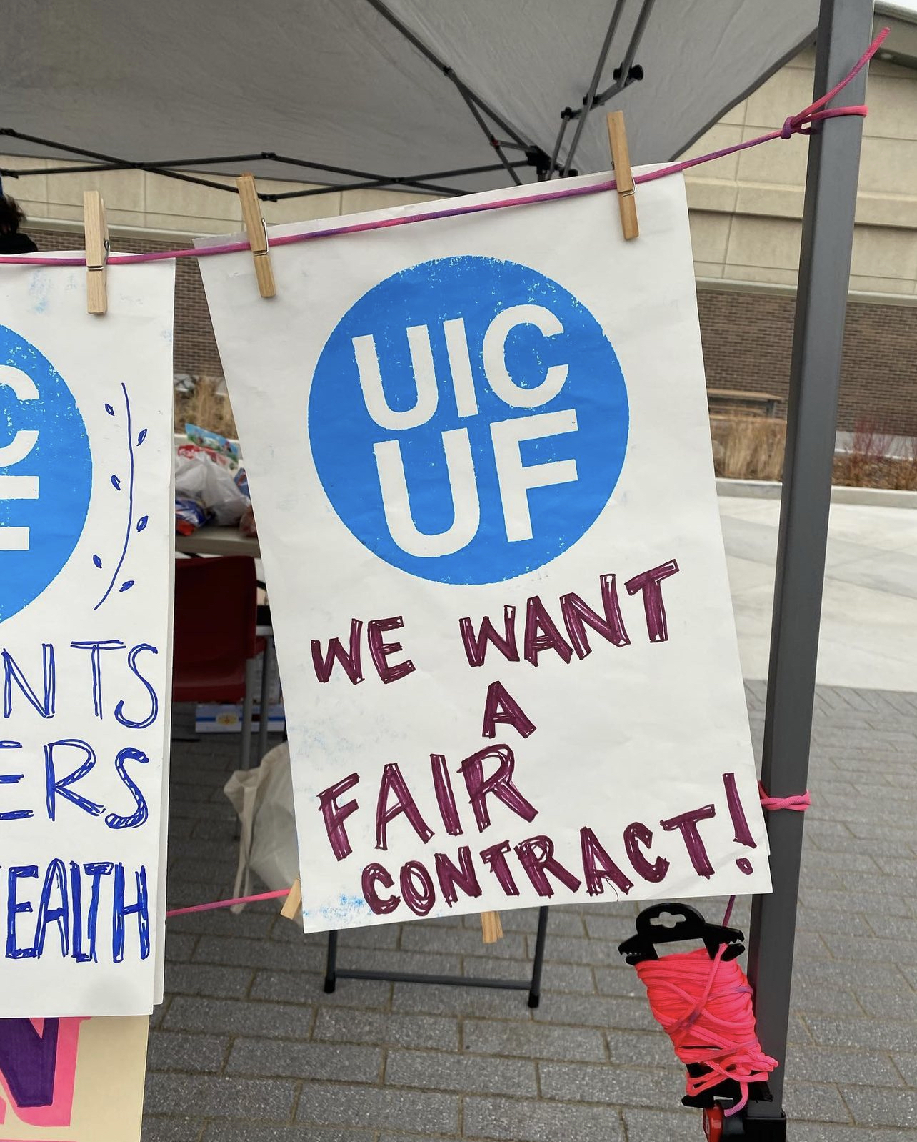 11 x 17 white poster with blue text that says UIC UF and violet text that reads We want a fair contract!
