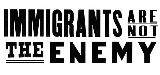 Immigrants are not the enemy banner