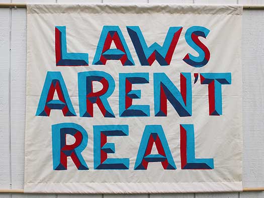 Laws Aren’t Real banner